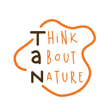TAN cupholder logo